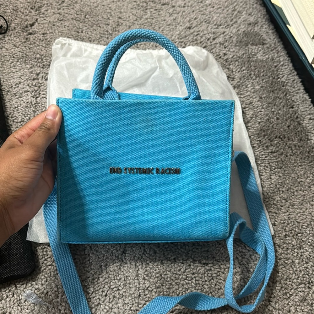 brandon blackwood end systemic racism bag
